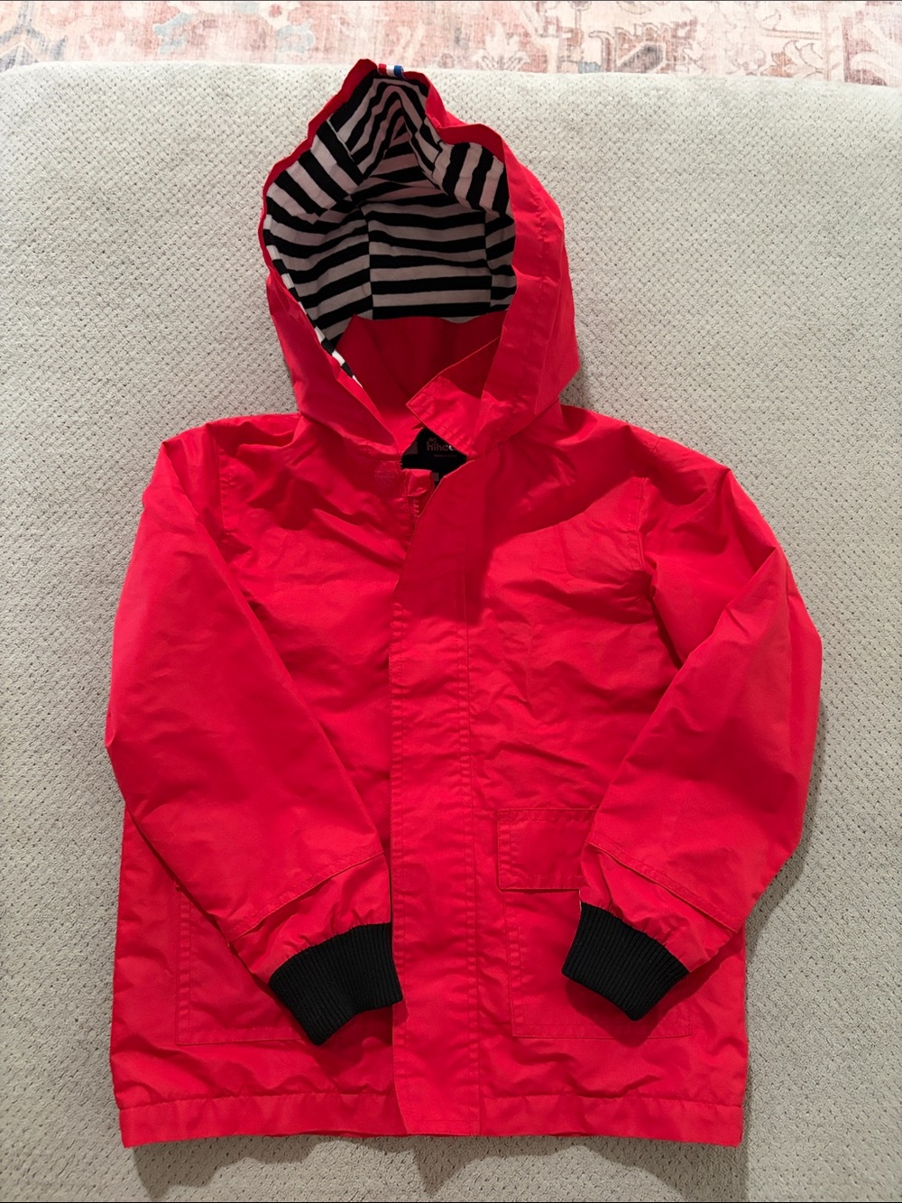 Bright Red Hooded Jacket with Striped Lining